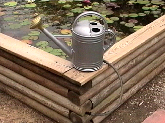 Watering Can spitter/fountain.